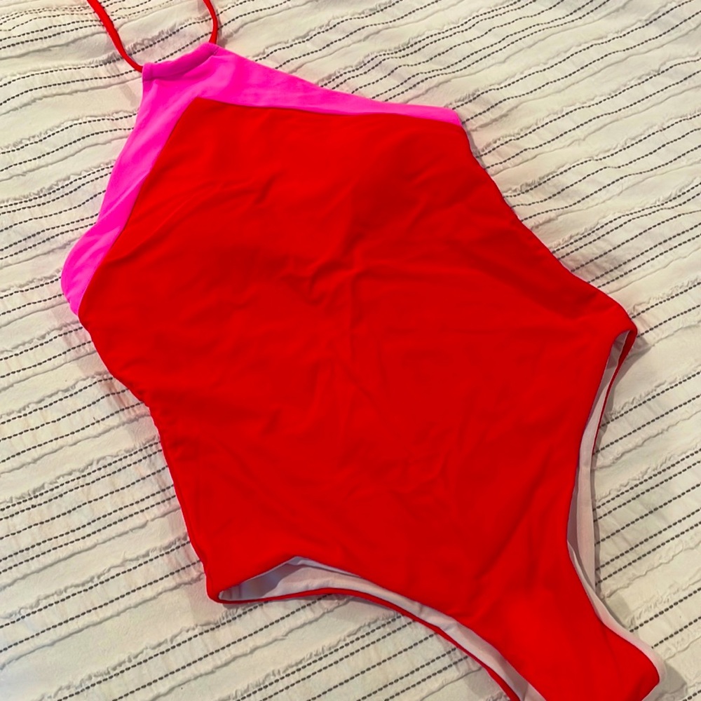 Pink lily swimsuit.  Never worn.